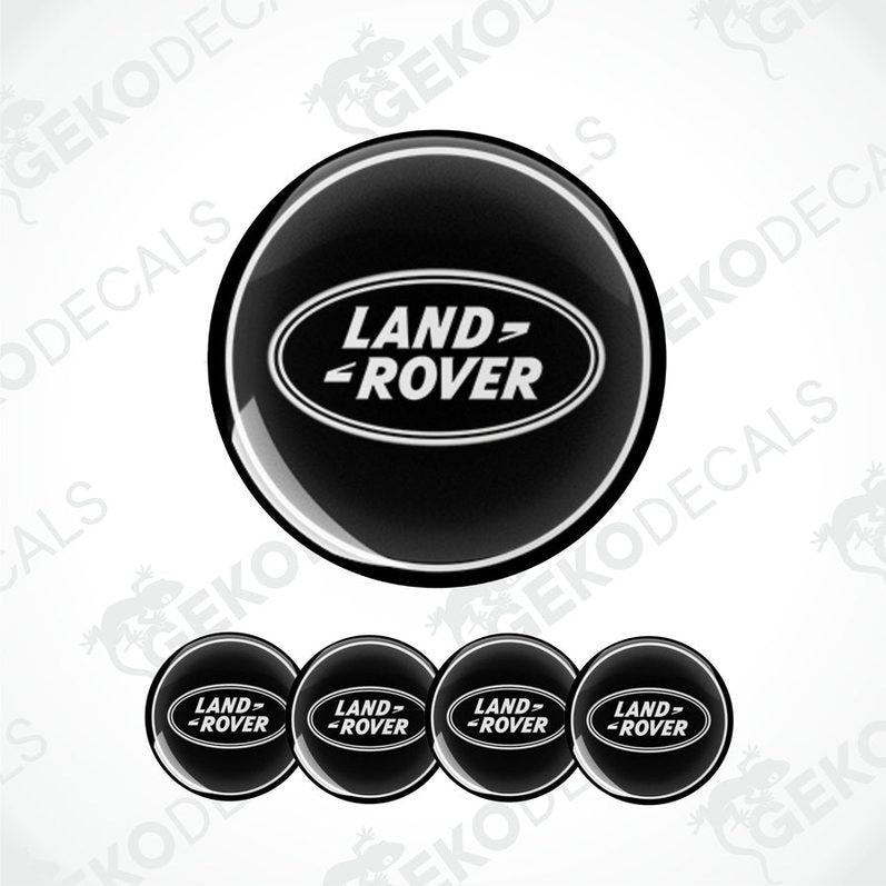A set of four black vinyl stickers with the 'LAND ROVER' text embossed on them, displayed against a white background.
