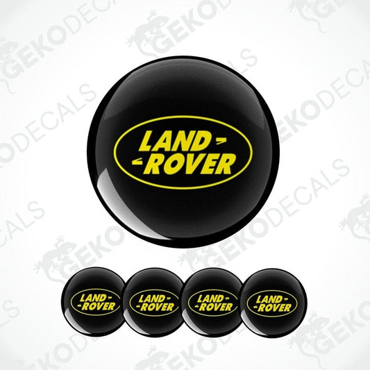 Set of four black and yellow vinyl decals with the 'LAND ROVER' logo.