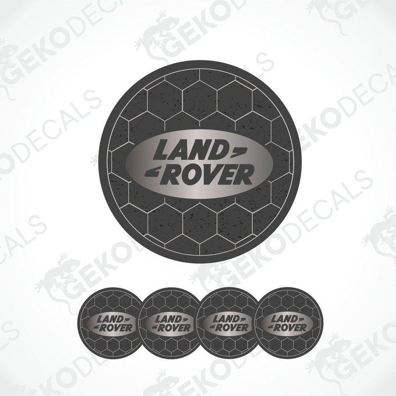 A set of four black vinyl stickers with the 'LAND ROVER' text embossed on them, displayed against a white background.