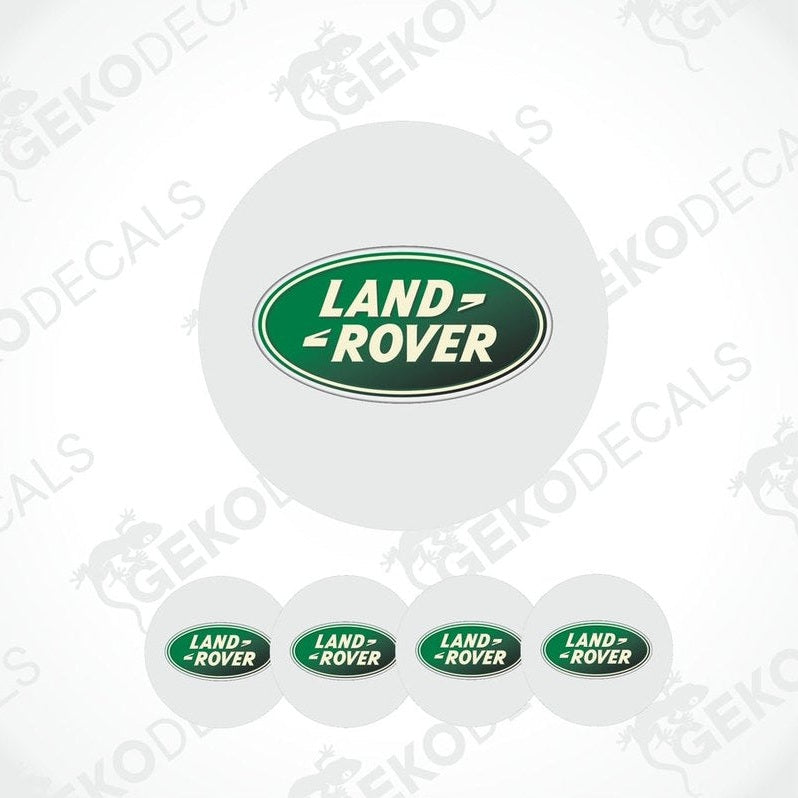 A set of four white vinyl stickers with the 'Land Rover' brand logo in green, displayed on a white background.