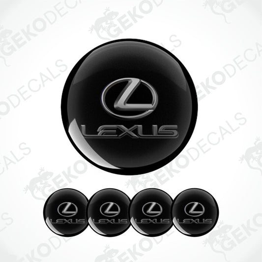 A set of four black round car decals with the grey Lexus logo.