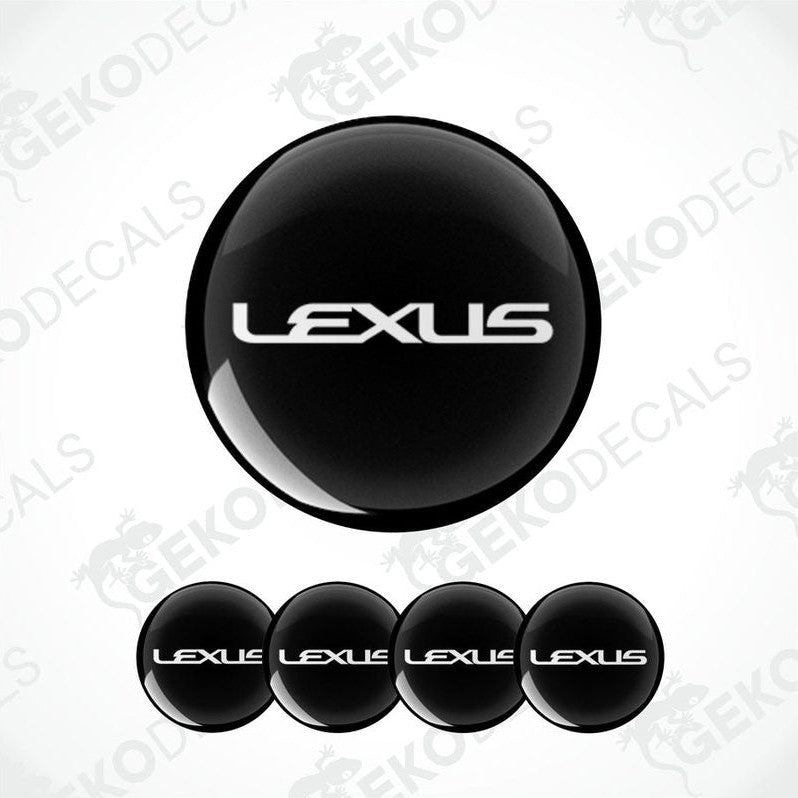 A set of four black vinyl stickers with the LEXUS brand logo on them.