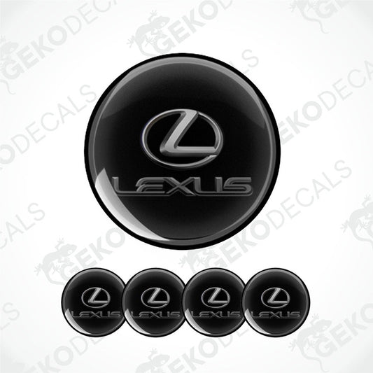 A set of four black round car decals with the grey Lexus logo.