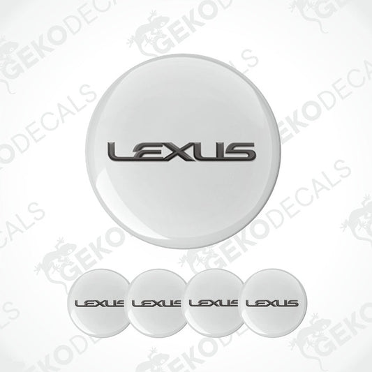 A set of four white vinyl decals with the black LEXUS logo, designed for use as car wheel caps or stickers.