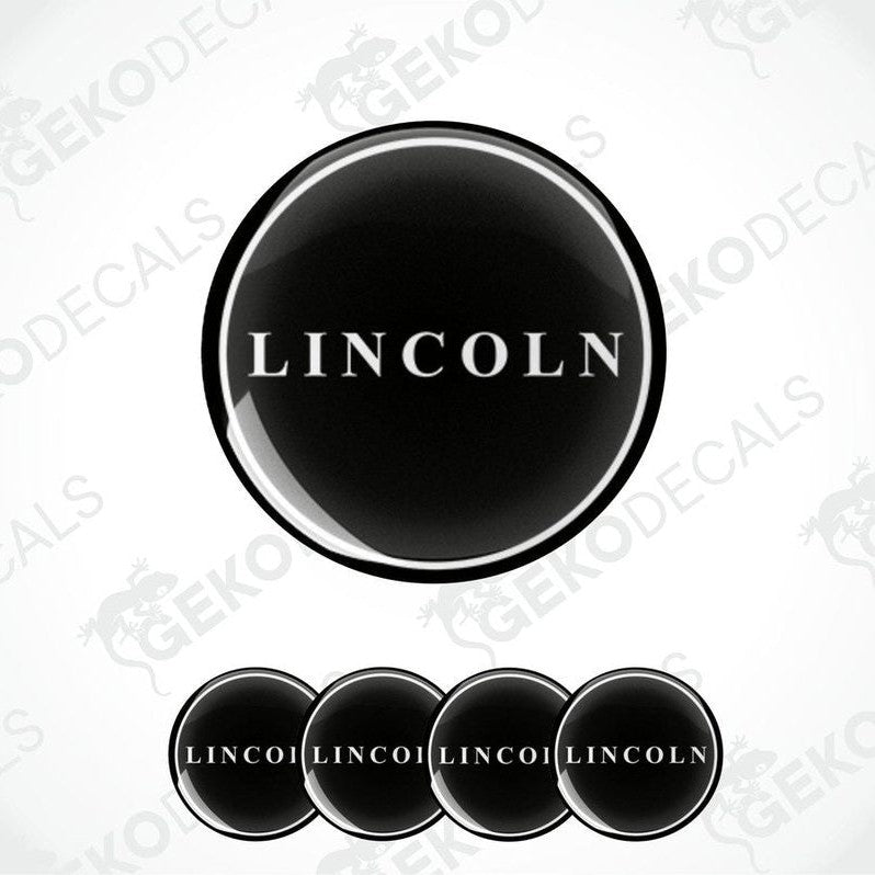 A set of four round black vinyl stickers with the word 'LINCOLN' in the center