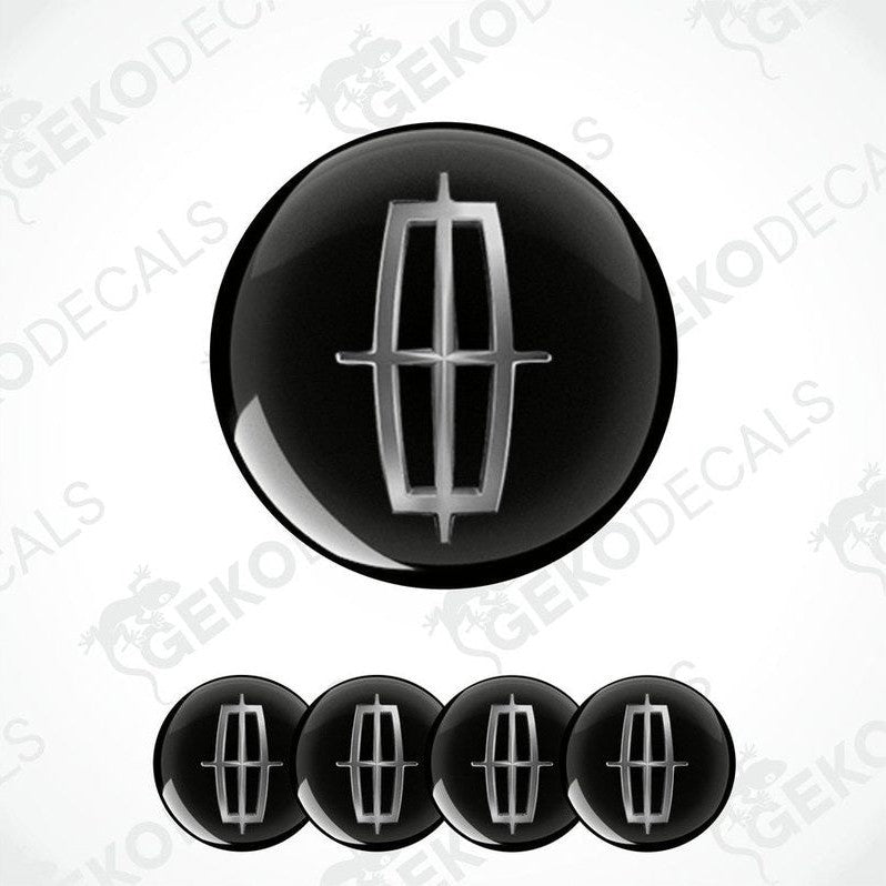 A set of four black vinyl decals with a silver Lincoln logo, displayed on a white background.