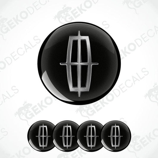 A set of four black vinyl decals with a silver Lincoln logo, displayed on a white background.