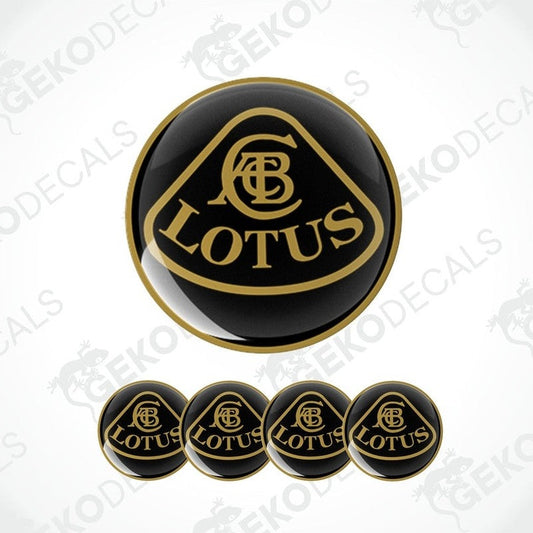 A set of black and brown vinyl decals with the Lotus logo, including four round decals and one larger oval decal.