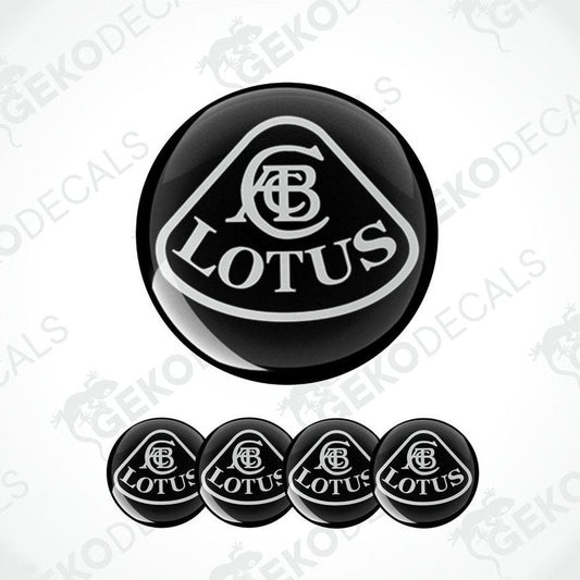 A set of black vinyl decals with the Lotus logo, including one larger emblem and four smaller ones, arranged in a row.