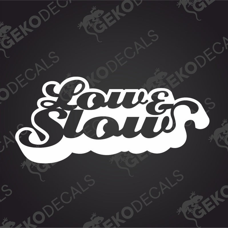 A white graphic decal with the words 'Low & Slow' in a curved, decorative font.