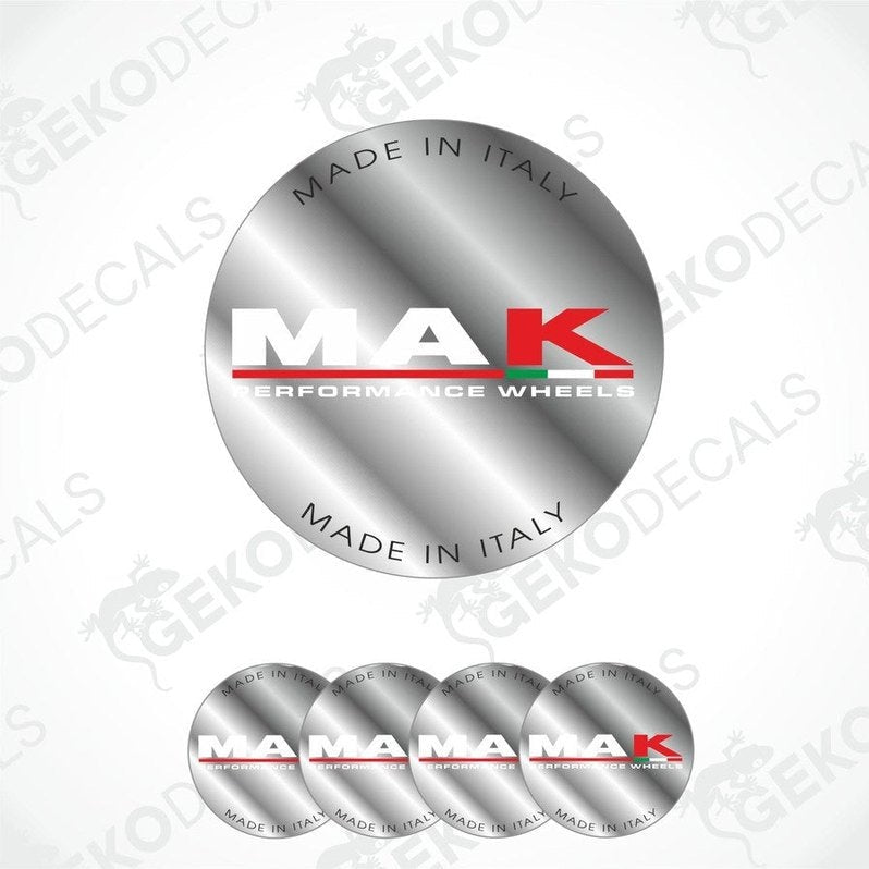 A set of four silver-colored vinyl stickers with 'MAK PERFORMANCE WHEELS' text and a red and black design, indicating they are made in Italy.