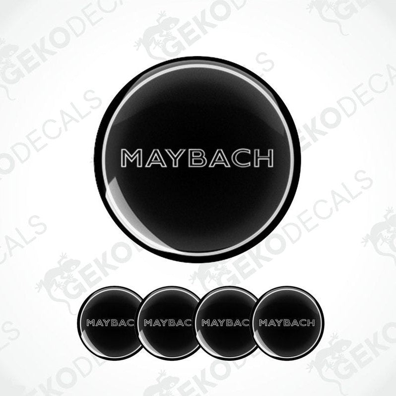 Set of four black vinyl decals with the text 'MAYBACH' on them, presented against a white background.