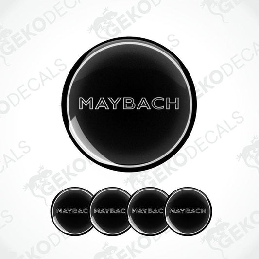 Set of four black vinyl decals with the text 'MAYBACH' on them, presented against a white background.