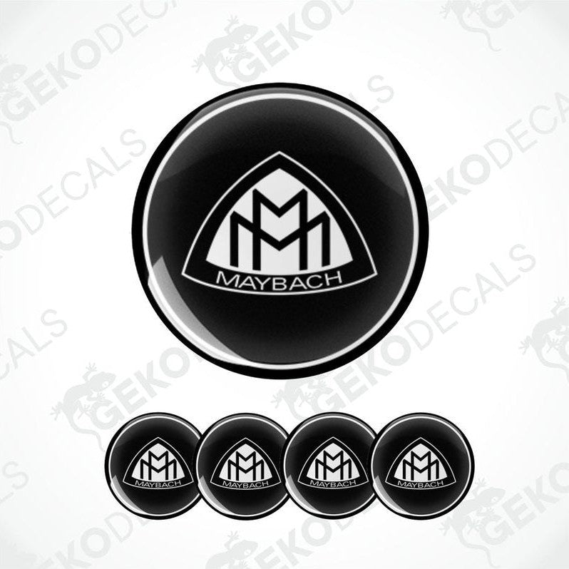 Set of four round car decals with the Maybach logo in black and white.