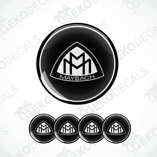 Set of four round car decals with the Maybach logo in black and white.
