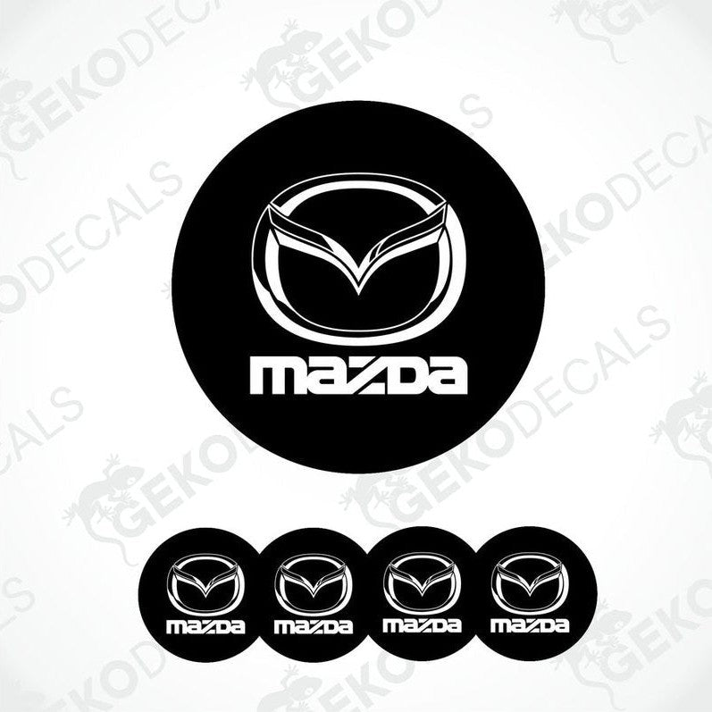 A set of four black vinyl stickers with the Mazda logo in white.