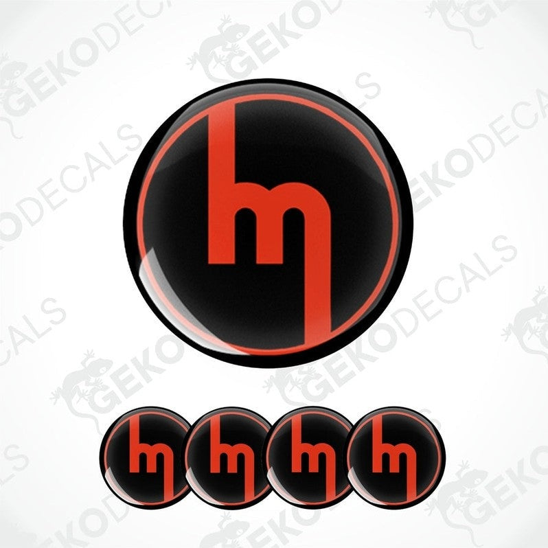 A set of four black and red vinyl decals with the MAZDA logo design.