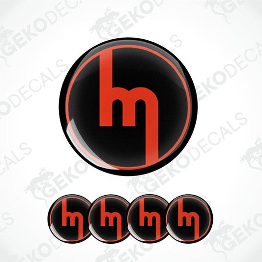 A set of four black and red vinyl decals with the MAZDA logo design.
