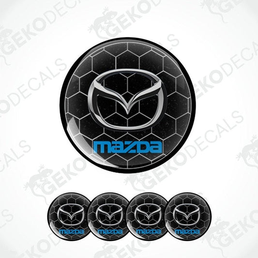 A set of four black and blue Mazda branded vinyl decals, three shown on a car and one on a white background.