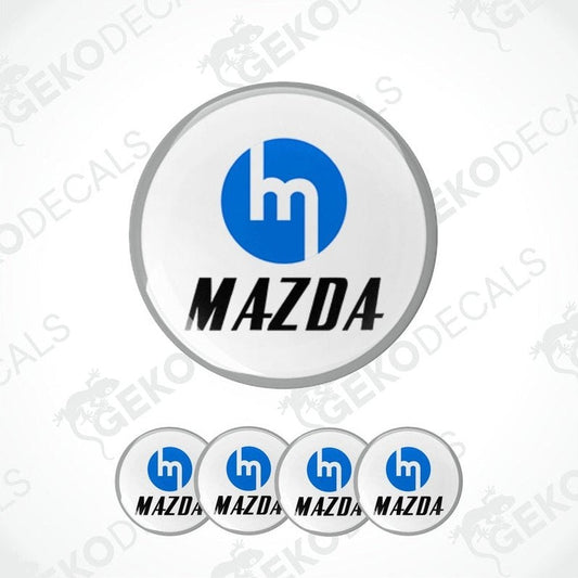 A set of four blue Mazda logo decals with a white background.