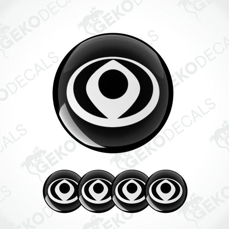 A set of four black and white circular vinyl stickers with a geometric design, associated with the brand MAZDA.