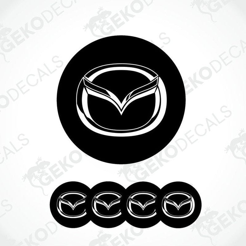 A set of four black vinyl stickers with a geometric design, including the MAZDA brand logo.