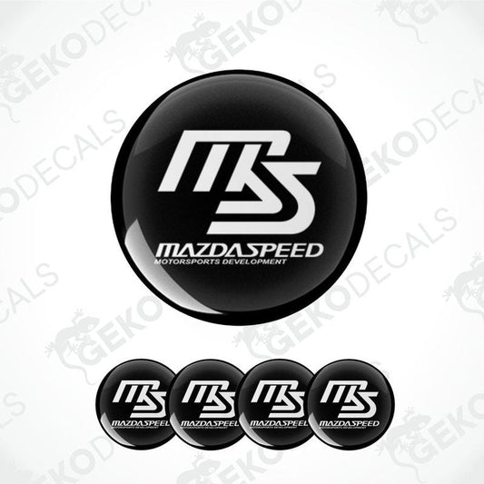 A set of black and white vinyl decals with the MAZDASPEED logo.