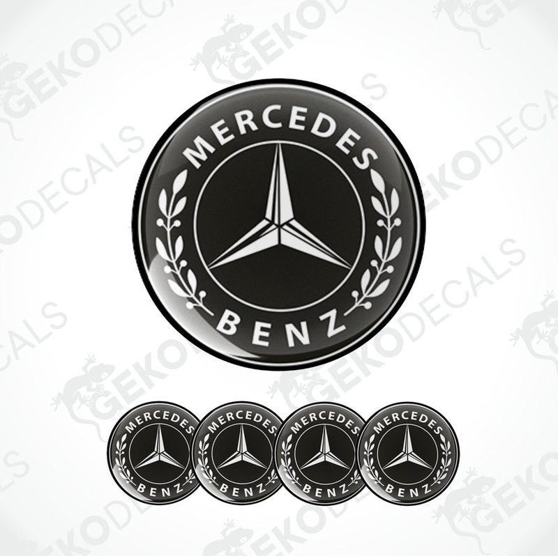 A set of four black vinyl decals with the Mercedes-Benz logo.