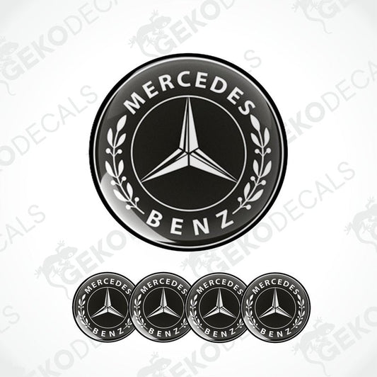 A set of four black vinyl decals with the Mercedes-Benz logo.