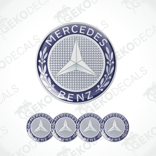 A set of four silver Mercedes-Benz branded vinyl stickers with a polyurethane coating, displayed against a white background.
