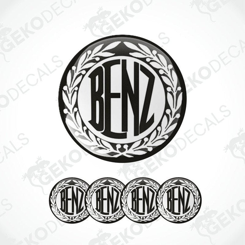 A set of four black vinyl stickers with the word 'MERCEDES BENZ' in a decorative font, designed for use as car decals.