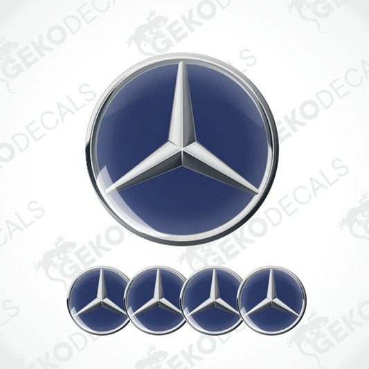A set of four blue and silver mercedes-benz emblem stickers with a polyurethane coating.
