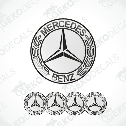 A set of four black and white vinyl decals with a polyurethane coating featuring the Mercedes-Benz star logo.