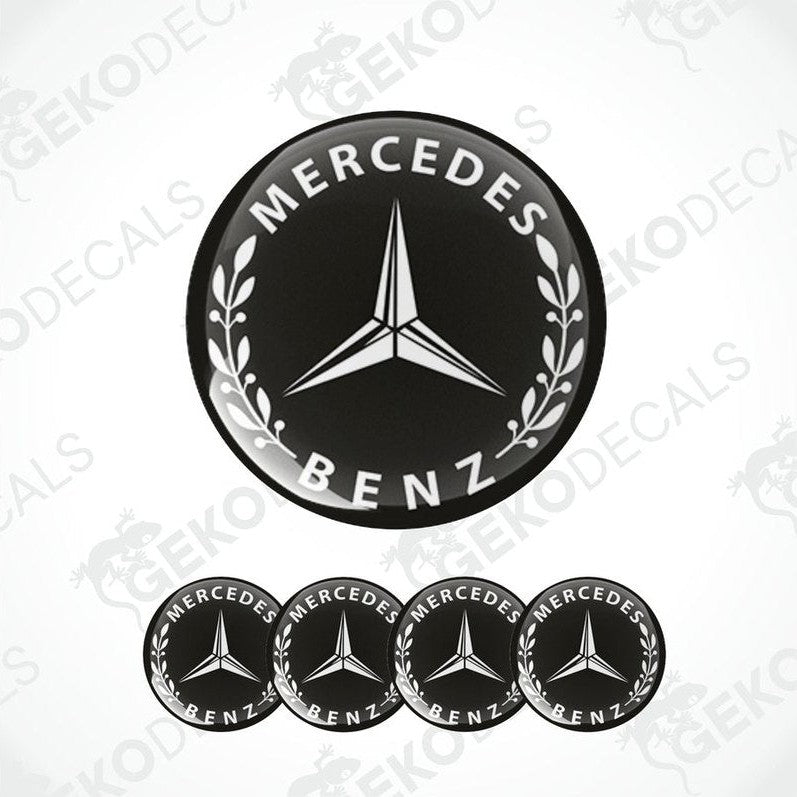 A set of four black vinyl decals with the Mercedes-Benz logo.