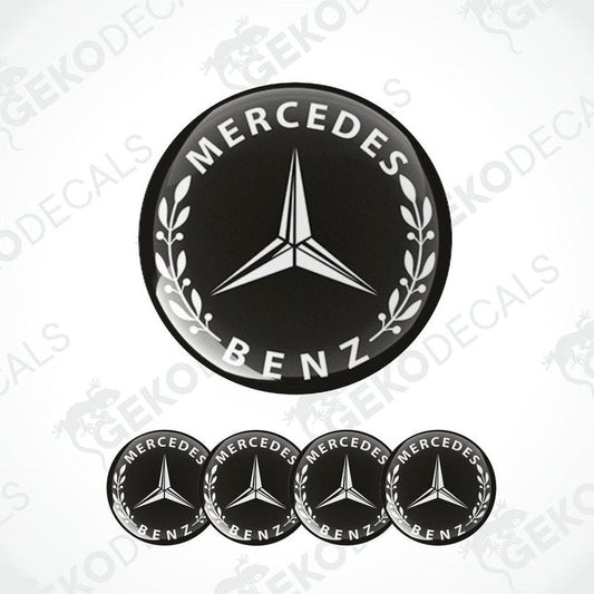 A set of four black vinyl decals with the Mercedes-Benz logo.