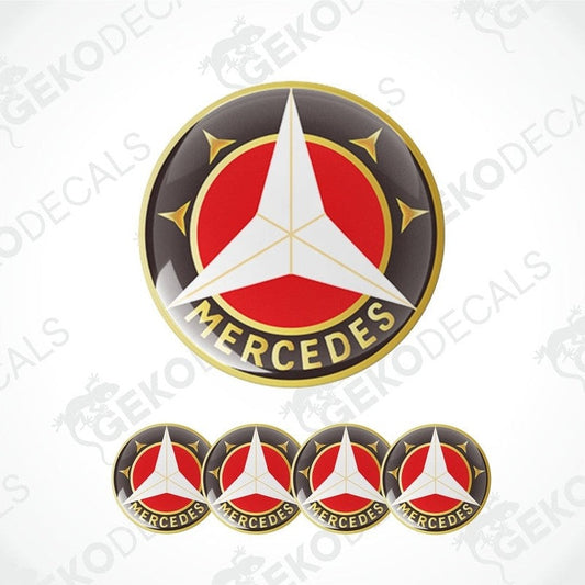 A set of four vinyl stickers with a Mercedes-Benz logo in red, white, and black colors.