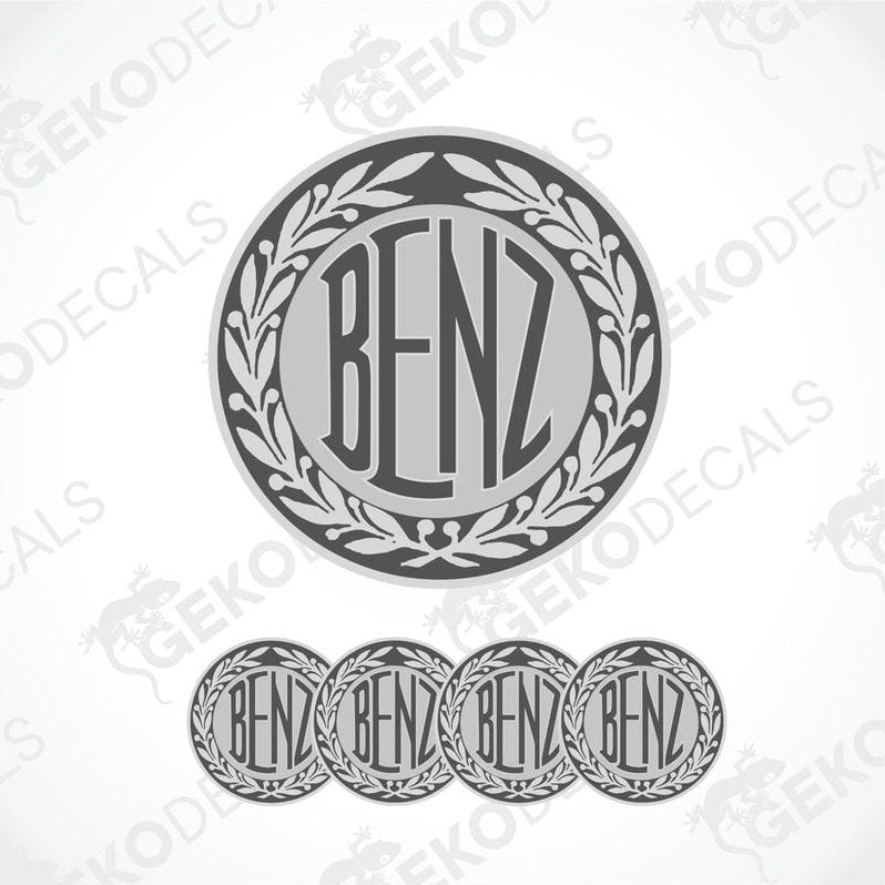 A set of vinyl decals with 'MERCEDES BENZ' branding, including one larger decal with a wreath design and four smaller round decals.