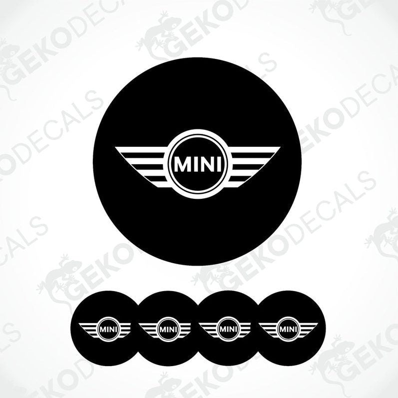 Set of four black vinyl decals with the Mini Cooper logo, designed for use on a vehicle's wheels.