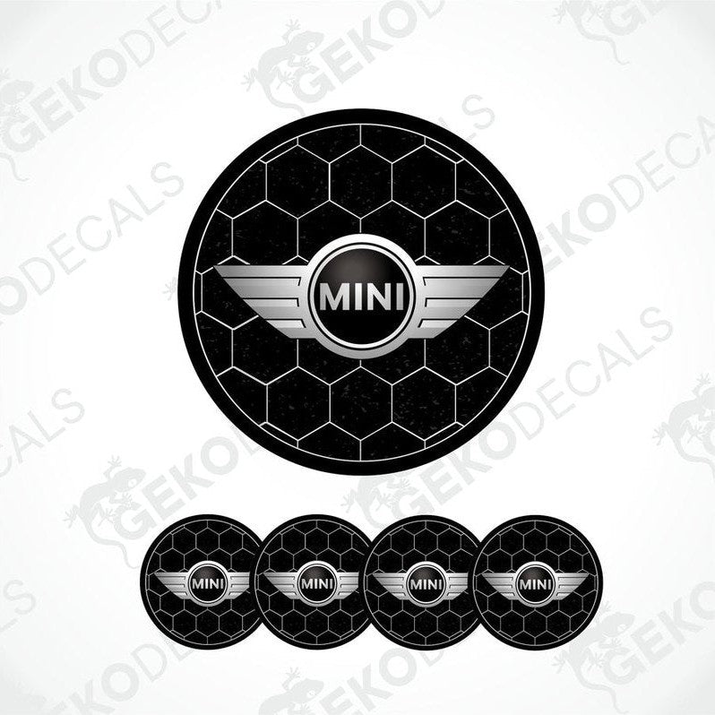A set of four black vinyl stickers with the text 'MINI COOPER' and a graphical design in the center, arranged in a circular pattern with a Gecko Decals logo at the top.