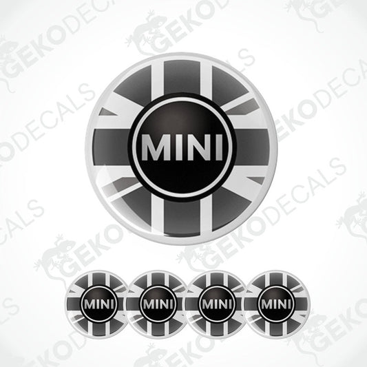 A set of four vinyl stickers with a British flag design and the Mini Cooper logo on them.