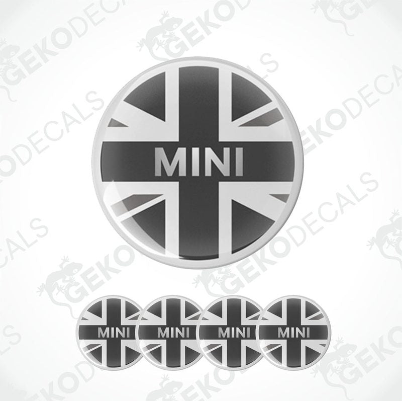 A set of four round vinyl stickers with a design of the British flag and the word 'MINI' in the center, displayed on a white background.