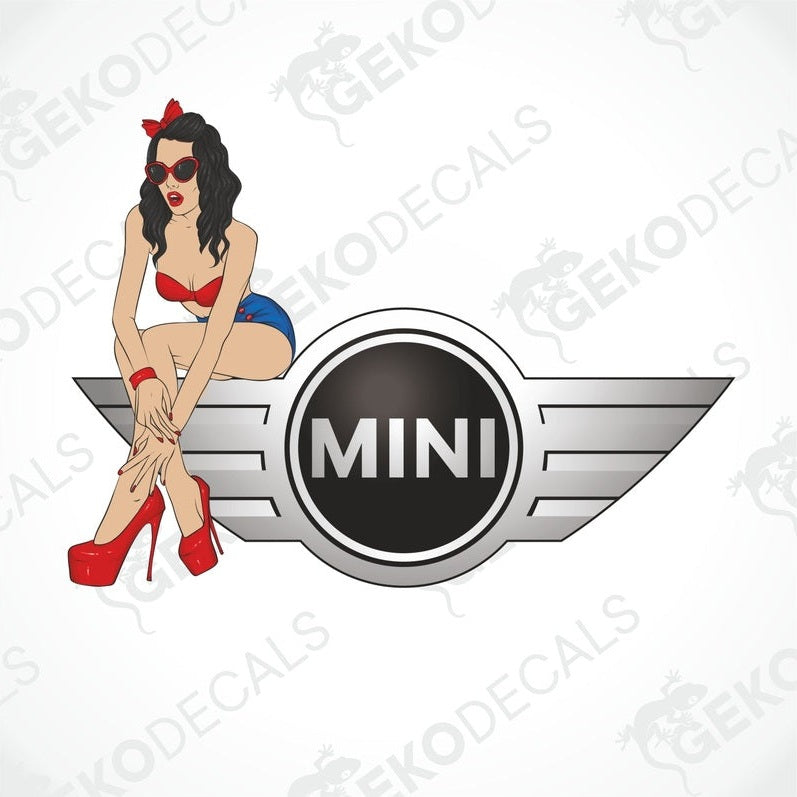 A car decal featuring an illustration of a stylized woman in a bikini sitting beside the Mini Cooper logo.