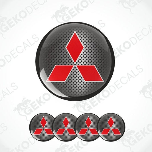 A set of four black vinyl stickers with a red Mitsubishi logo, designed for use as car decals.