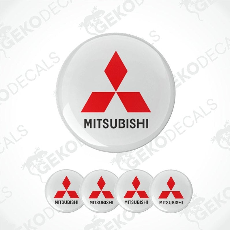 A set of four Mitsubishi car decals with the red and white Mitsubishi logo.