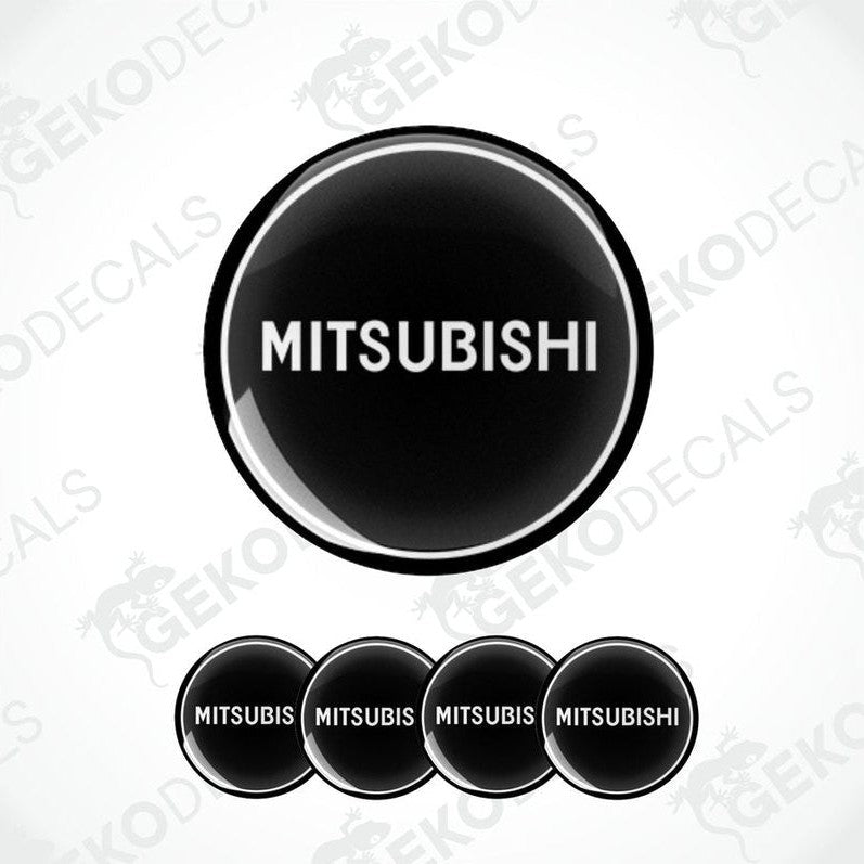 A set of black vinyl decals with the Mitsubishi logo, displayed in a circular arrangement.