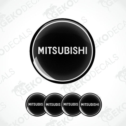 A set of black vinyl decals with the Mitsubishi logo, displayed in a circular arrangement.