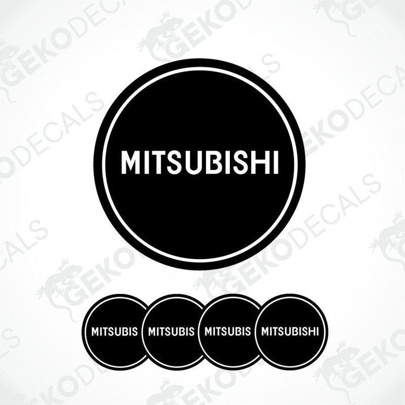 A set of black vinyl decals with the Mitsubishi logo, displayed in a circular arrangement.