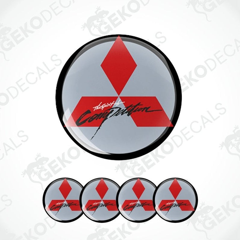 A set of four round vinyl stickers with a geometric design featuring red and gray colors and the Mitsubishi brand logo.