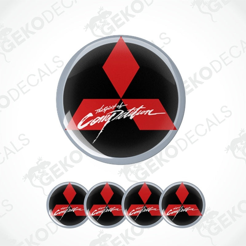 A set of black, red, and white decal with Mitsubishi logo and the text 'MITSUBISHI THE SPIRIT OF COMPETITION'.