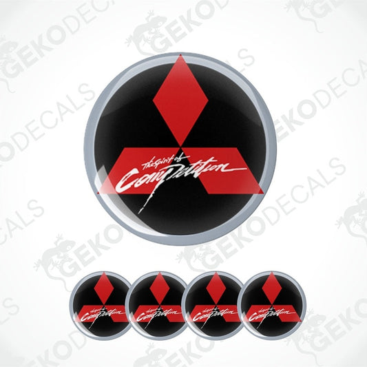 A set of black, red, and white decal with Mitsubishi logo and the text 'MITSUBISHI THE SPIRIT OF COMPETITION'.
